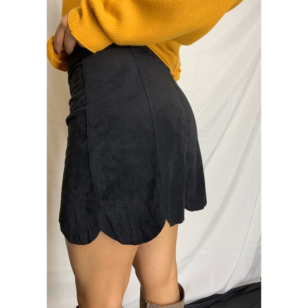 Black button-front suede high waist skirt.